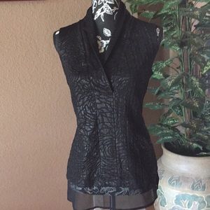 Black sleeveless floral blouse